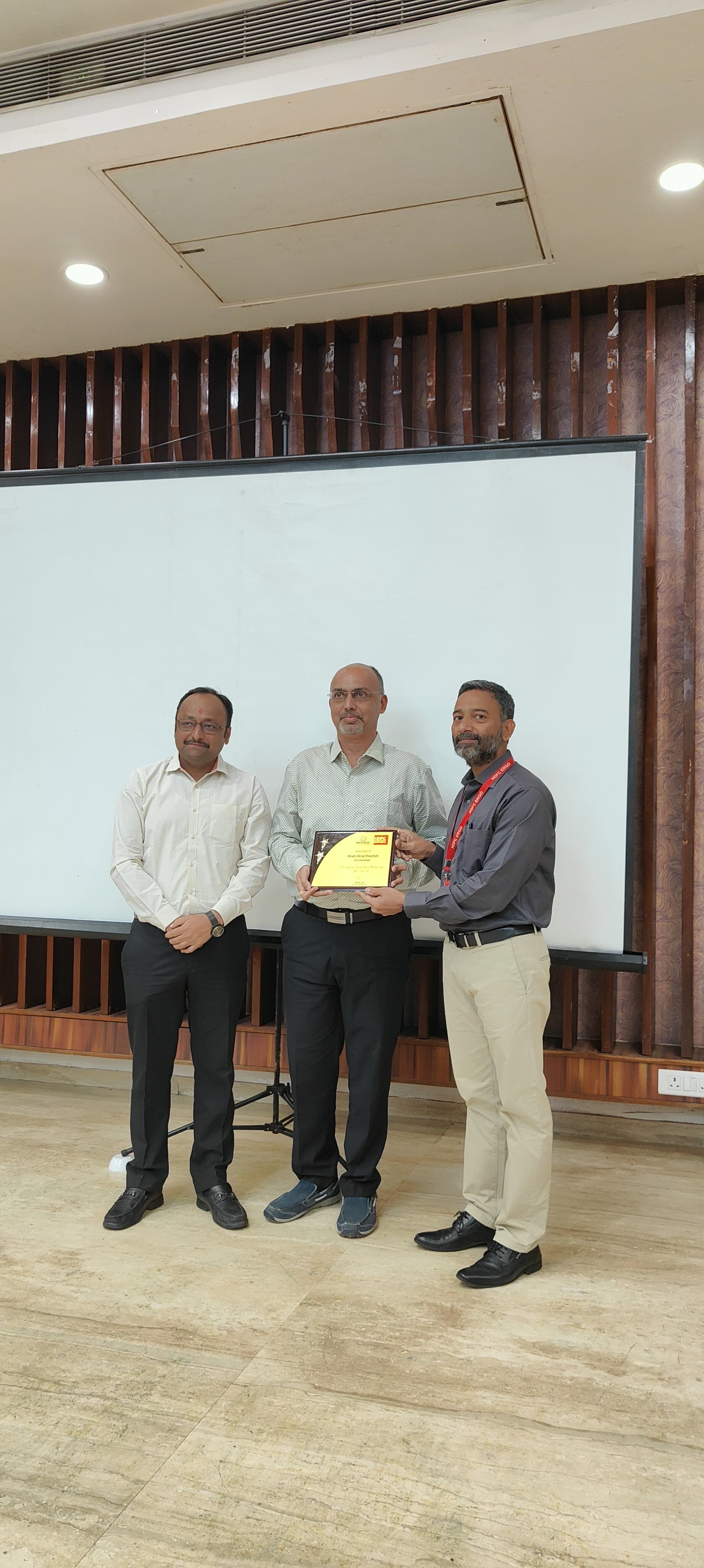 Certificate of achievement presented to Pradish Shah